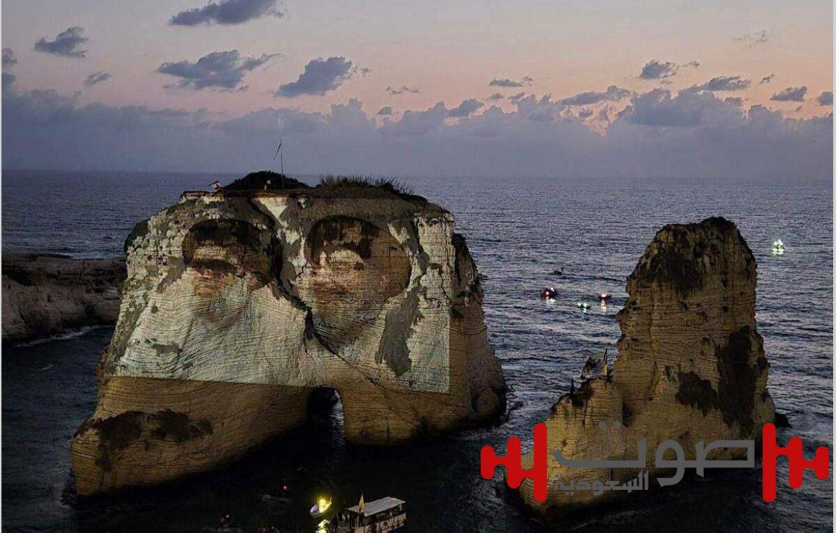 حزب الله يكسر قرار الحكومة بإضاءة صخرة الروشة بصور نصرالله وصفي الدين